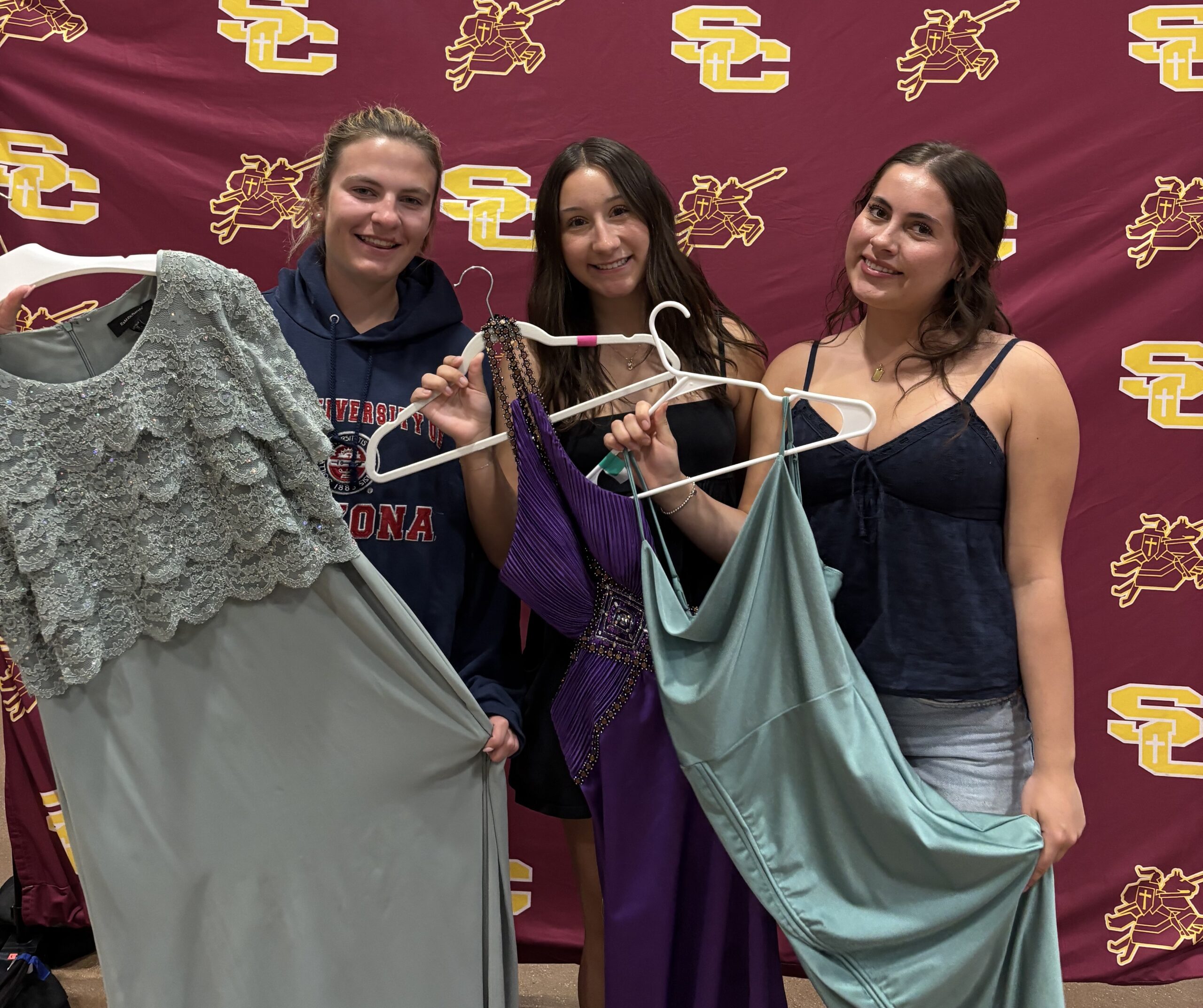 Dress Swap photo in front of backdrop